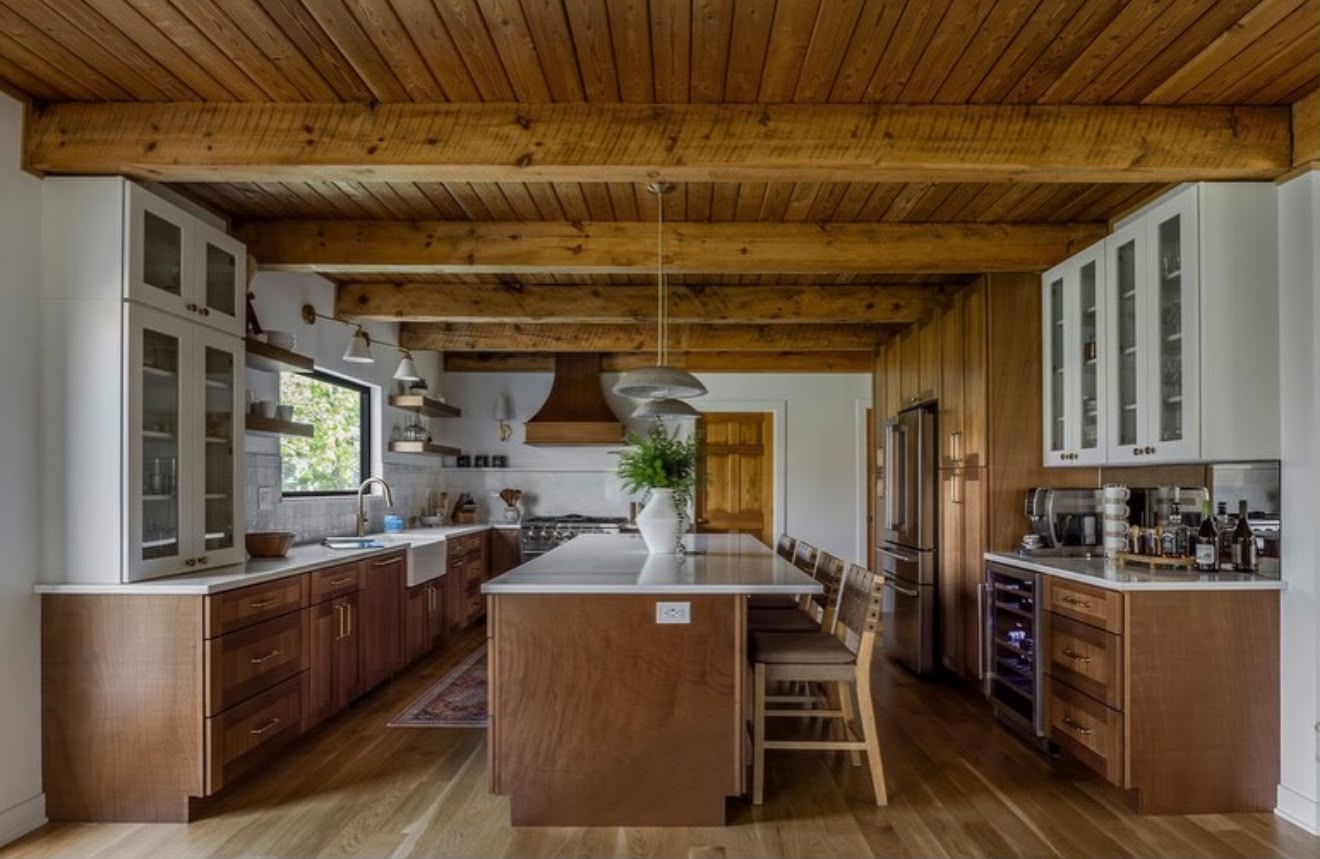 After photo of a completed kitchen renovation with timber cabinetry and a finished island