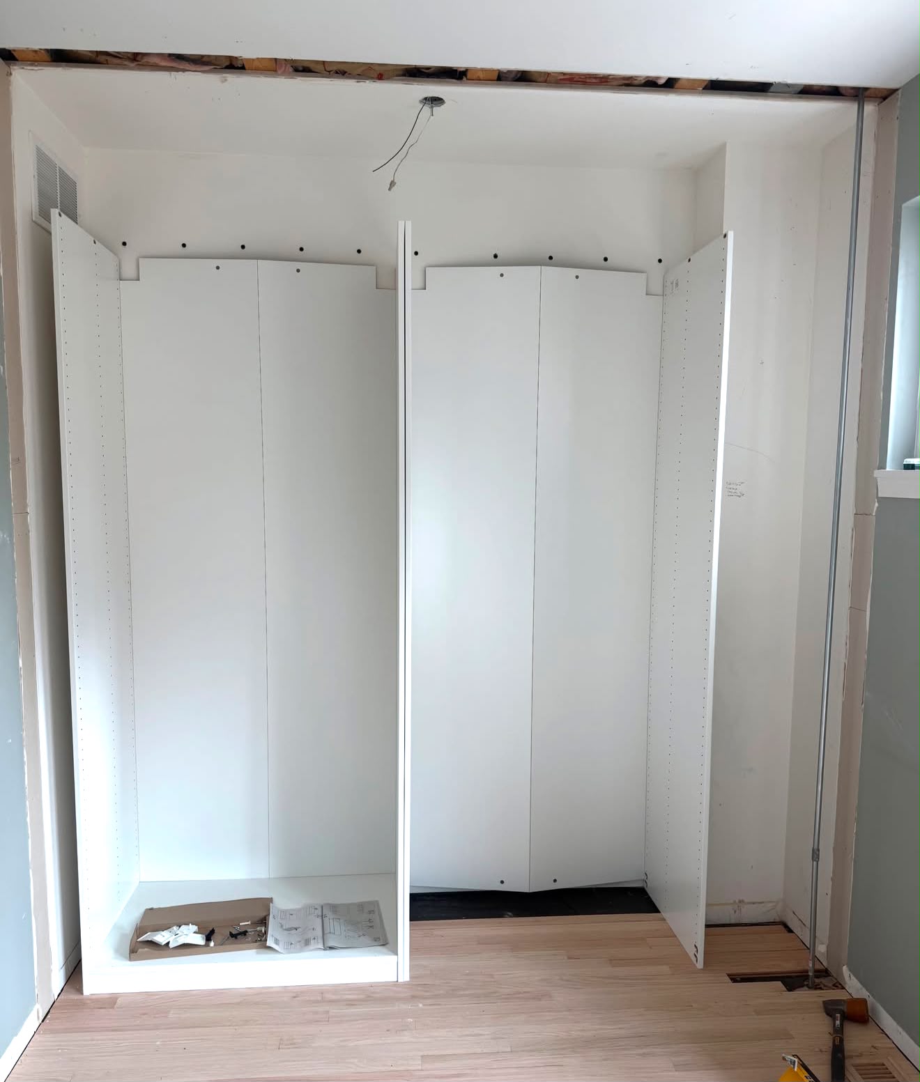 Before photo of built-in storage being constructed