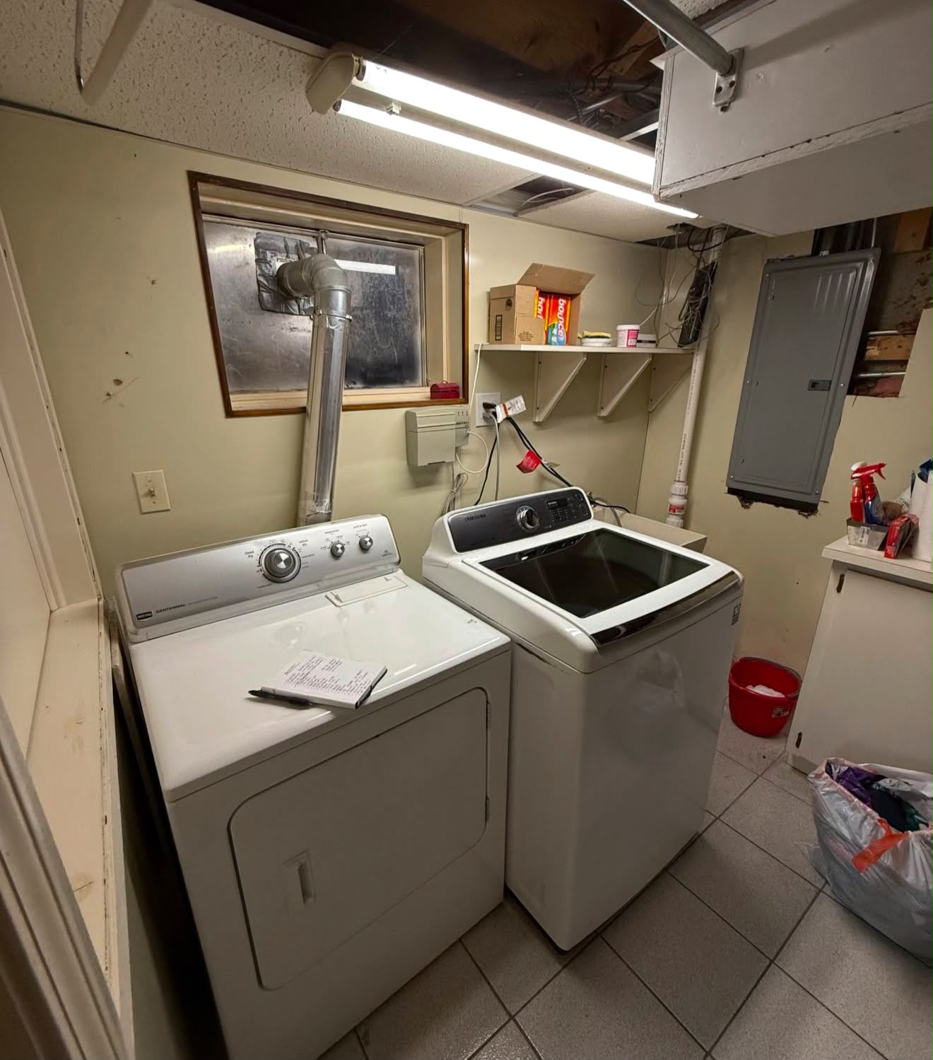 Before photo of an older laundry room